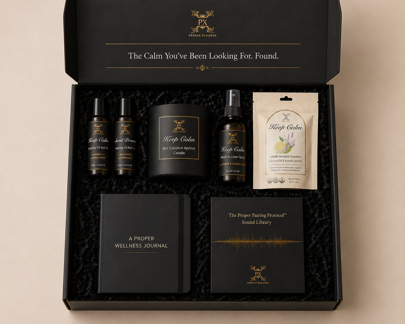 Gifting set with wellness products and journal on a beige background
