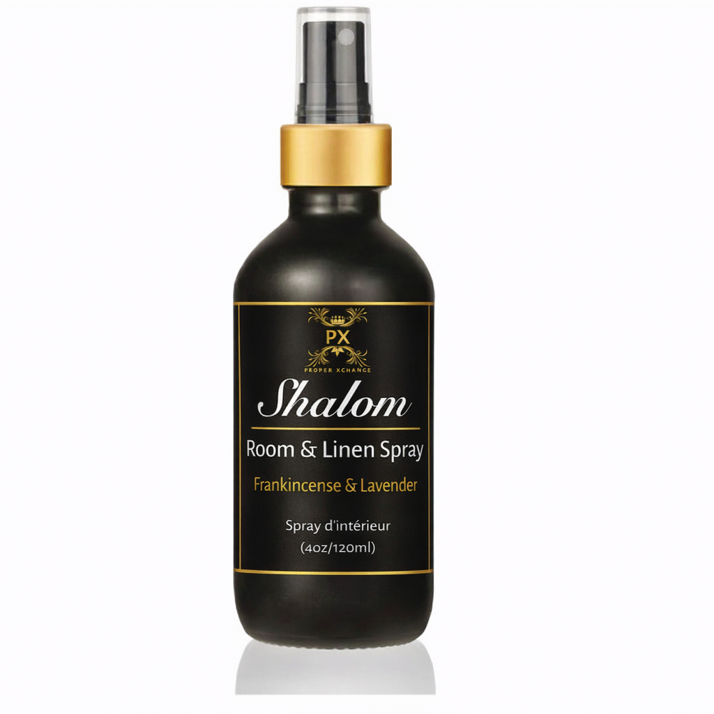 Room and linen spray bottle labeled 'Shalom' on a white background