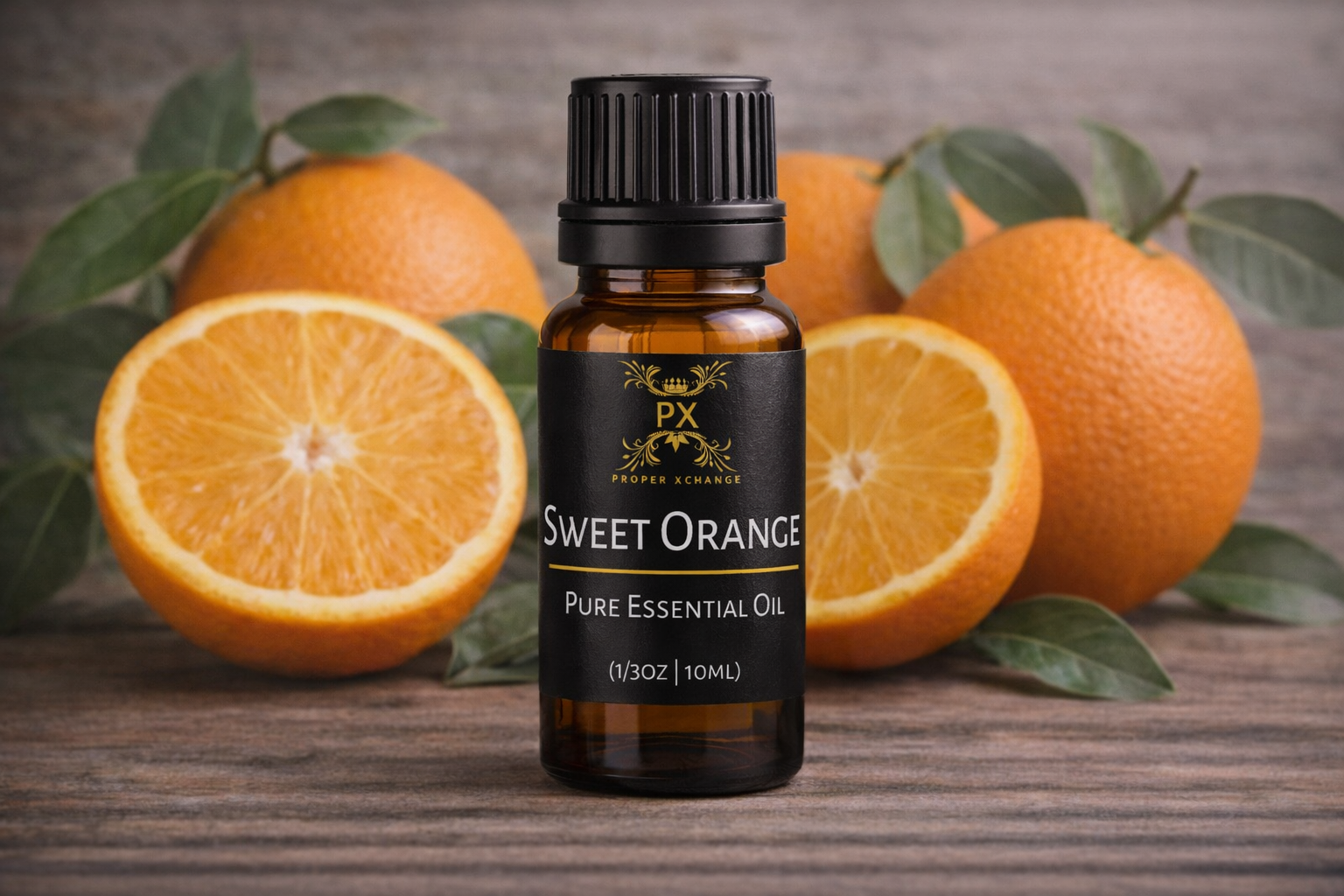 PX Sweet Orange pure essential oil bottle with oranges and leaves on a wooden surface
