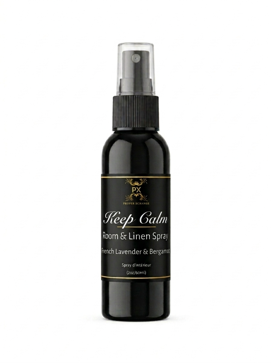 Black room and linen spray bottle labeled 'Keep Calm' on a white background