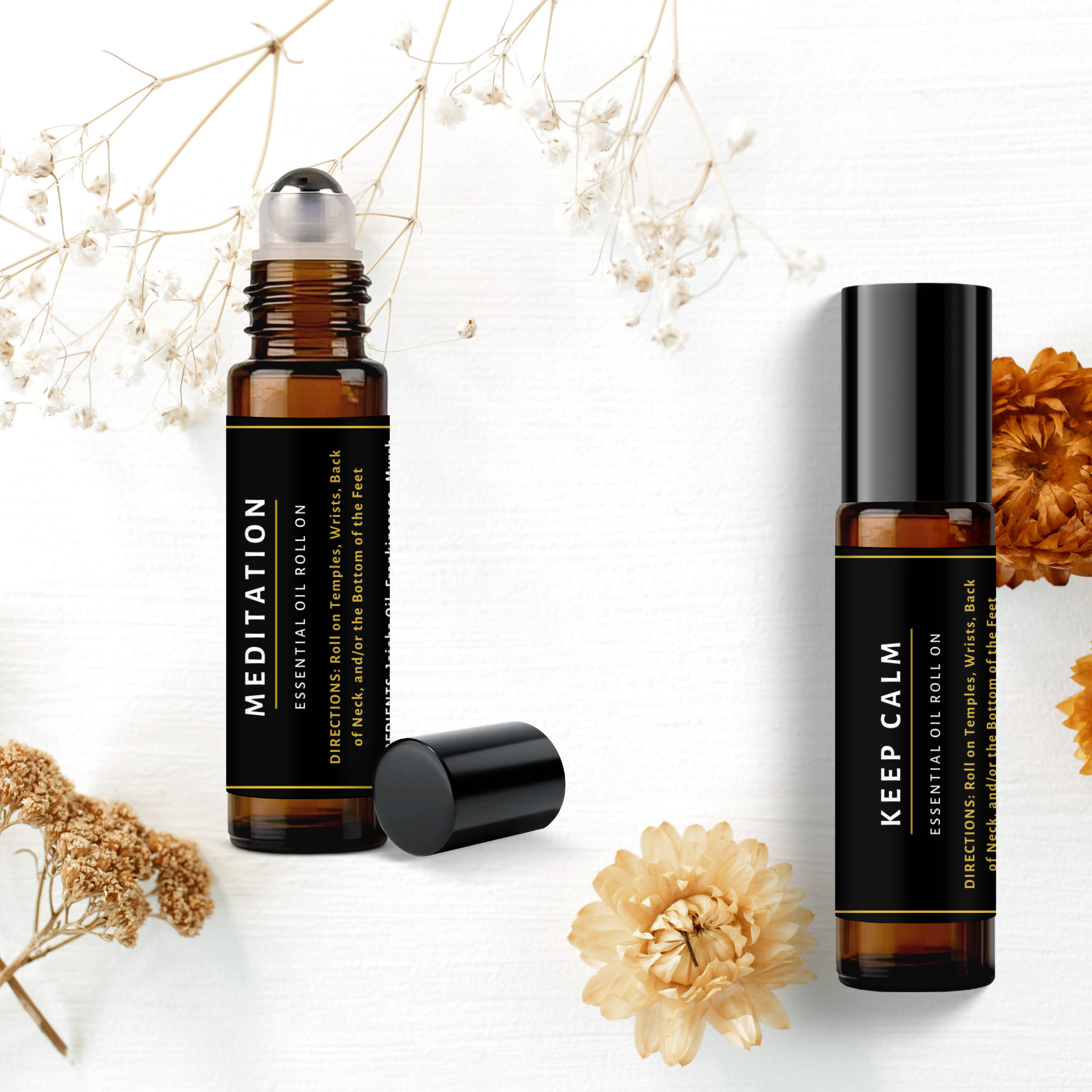 Two essential oil roller bottles labeled 'Meditation' and 'Keep Calm' on a white background with flowers.