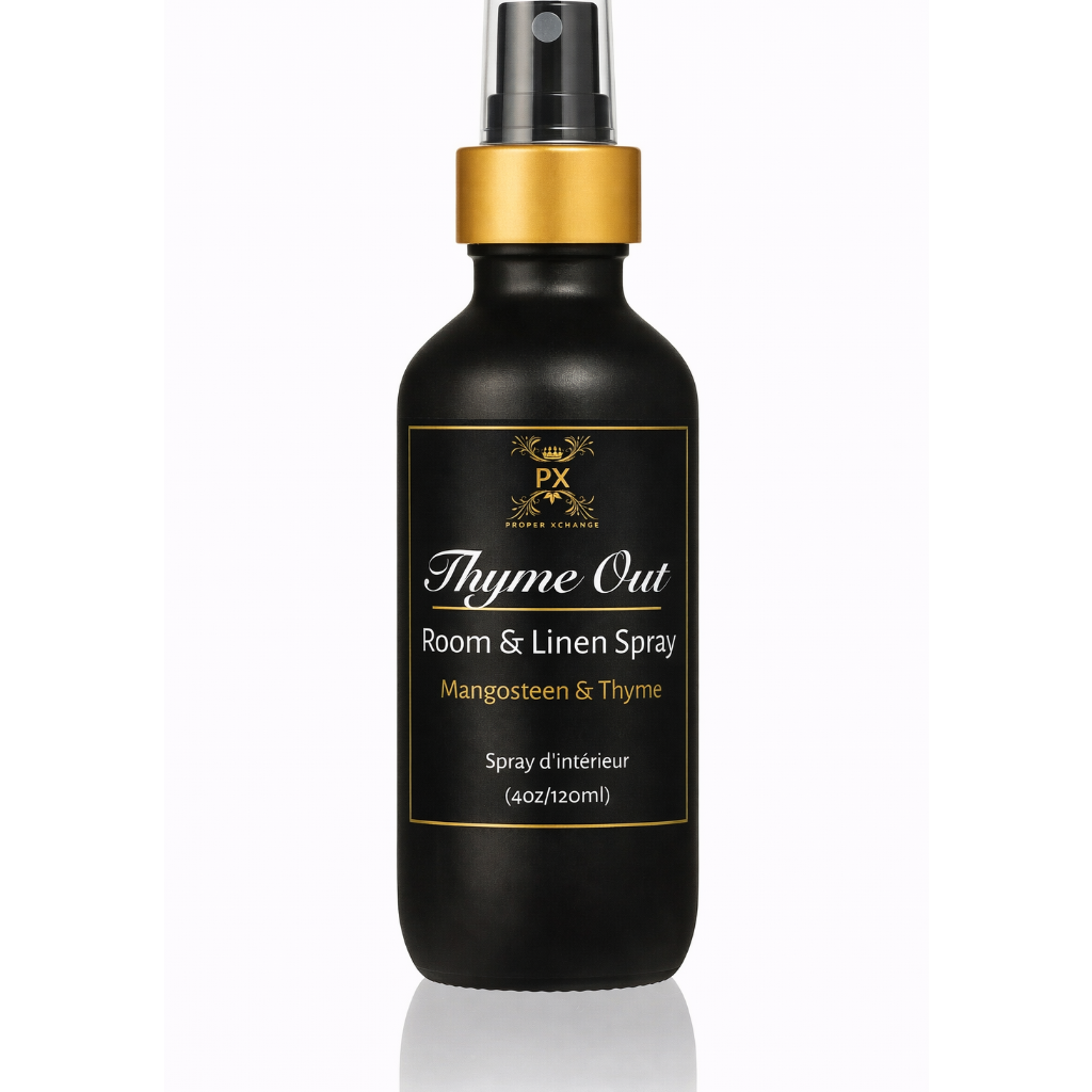 Black room and linen spray bottle with gold cap on a white background