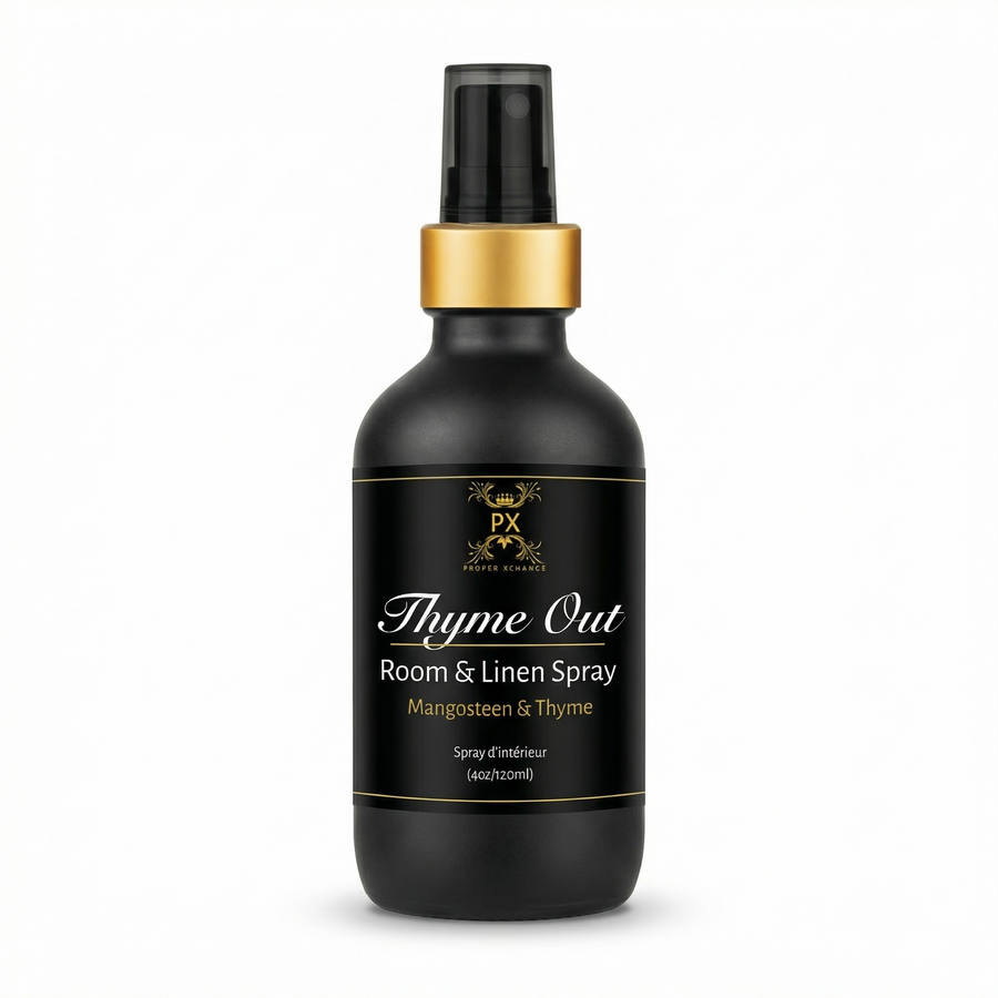 Black room and linen spray bottle with gold cap on a white background